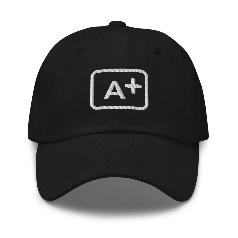 A black cap embroidered with the A+ service mark in a white rounded square.