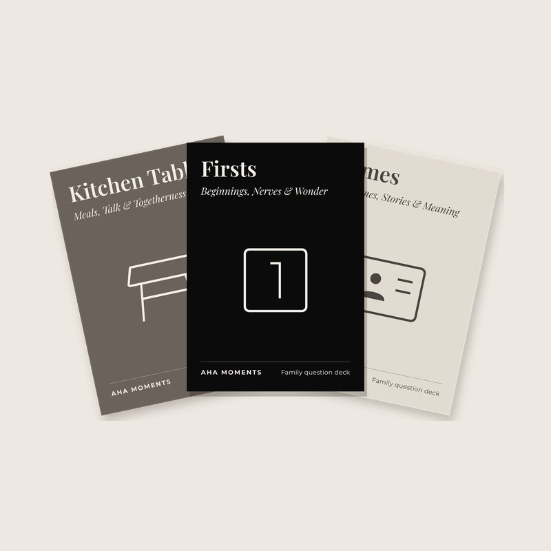 Three Family Question cards fanned out: Kitchen Table, Firsts, and Names