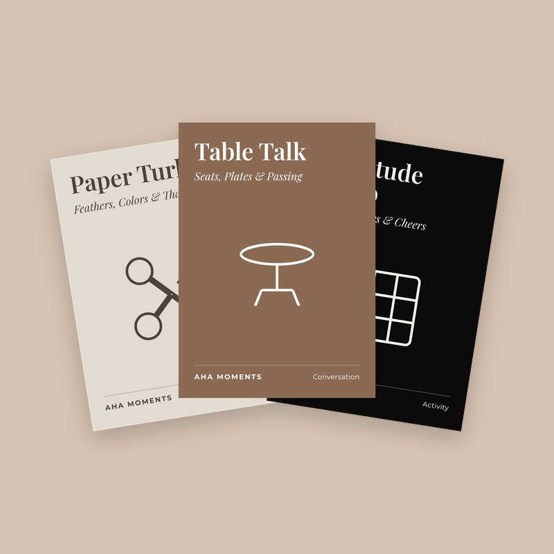 Three Thanksgiving cards fanned out: Paper Turkey, Table Talk, and Gratitude Bingo
